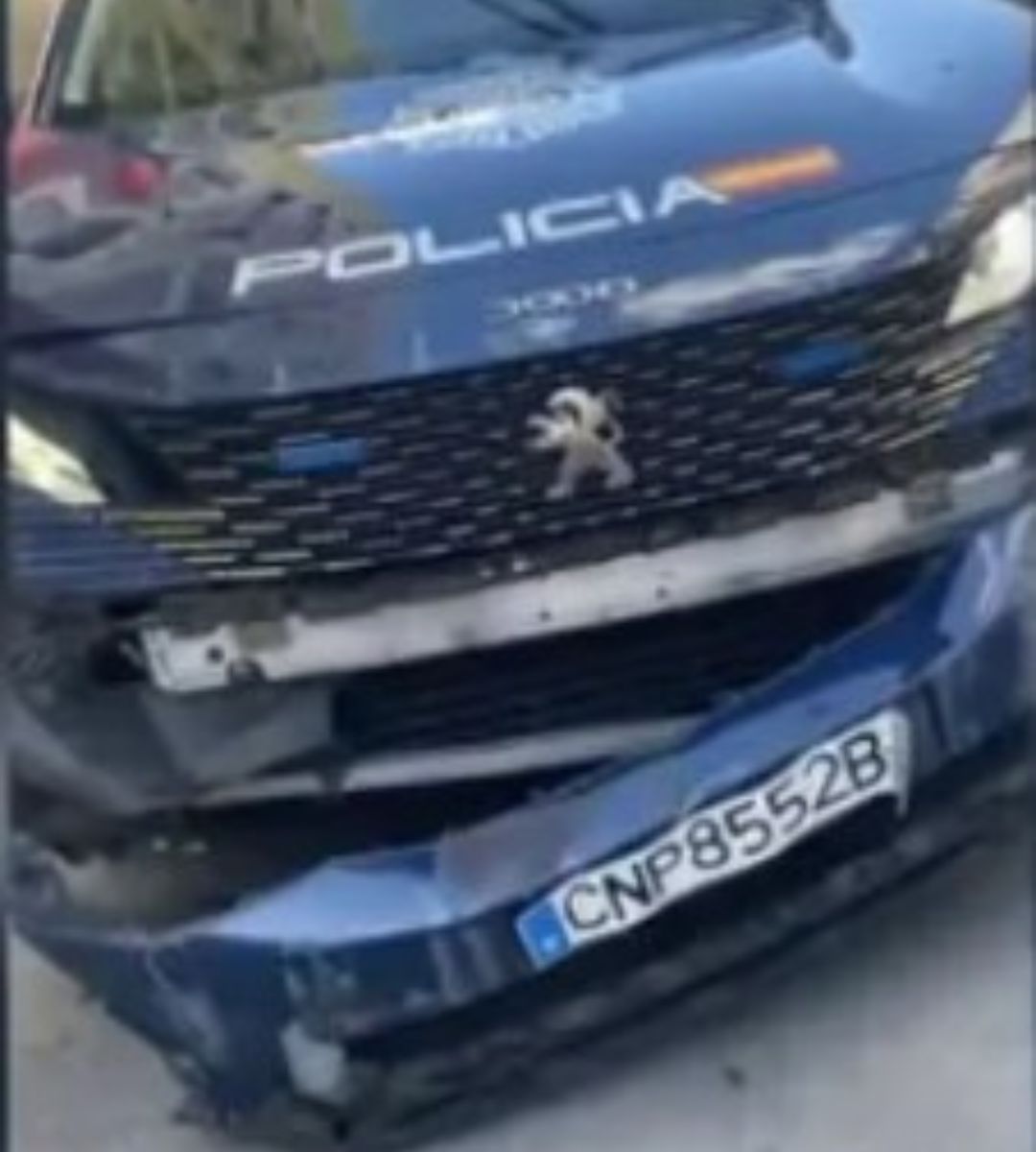 loviți de o mașină de poliție în Madrid